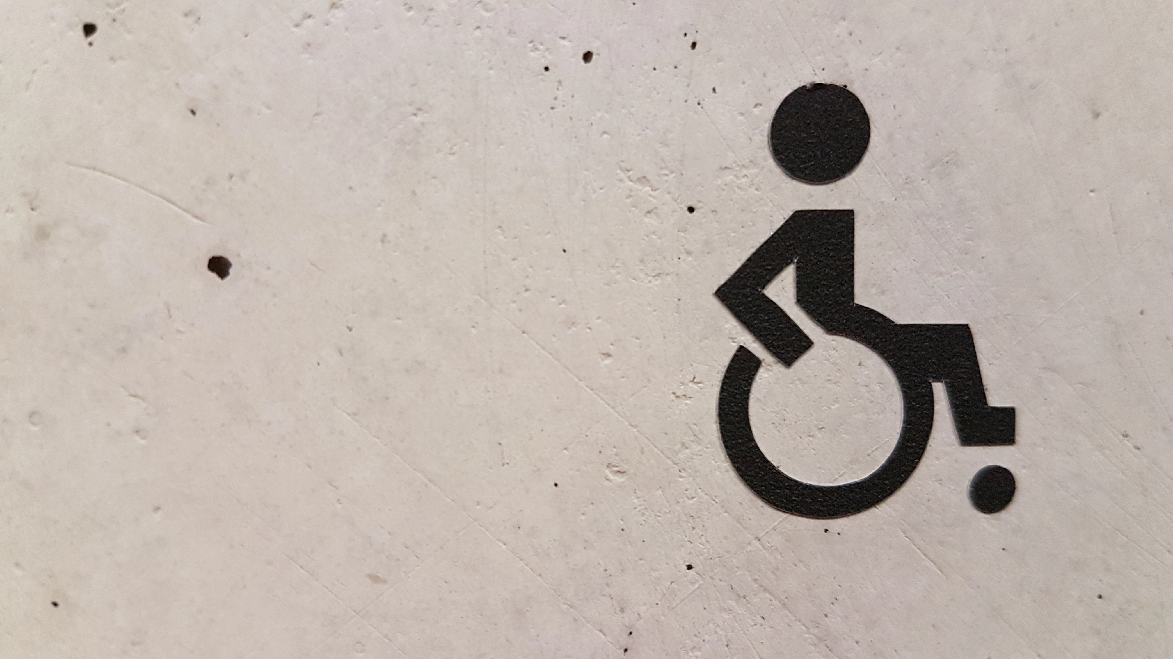 signe fauteuil roulant